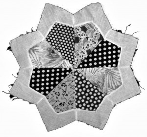 Fragment of a pieced star quilt made by Julian Samora's mother, M. Carmen Samora.